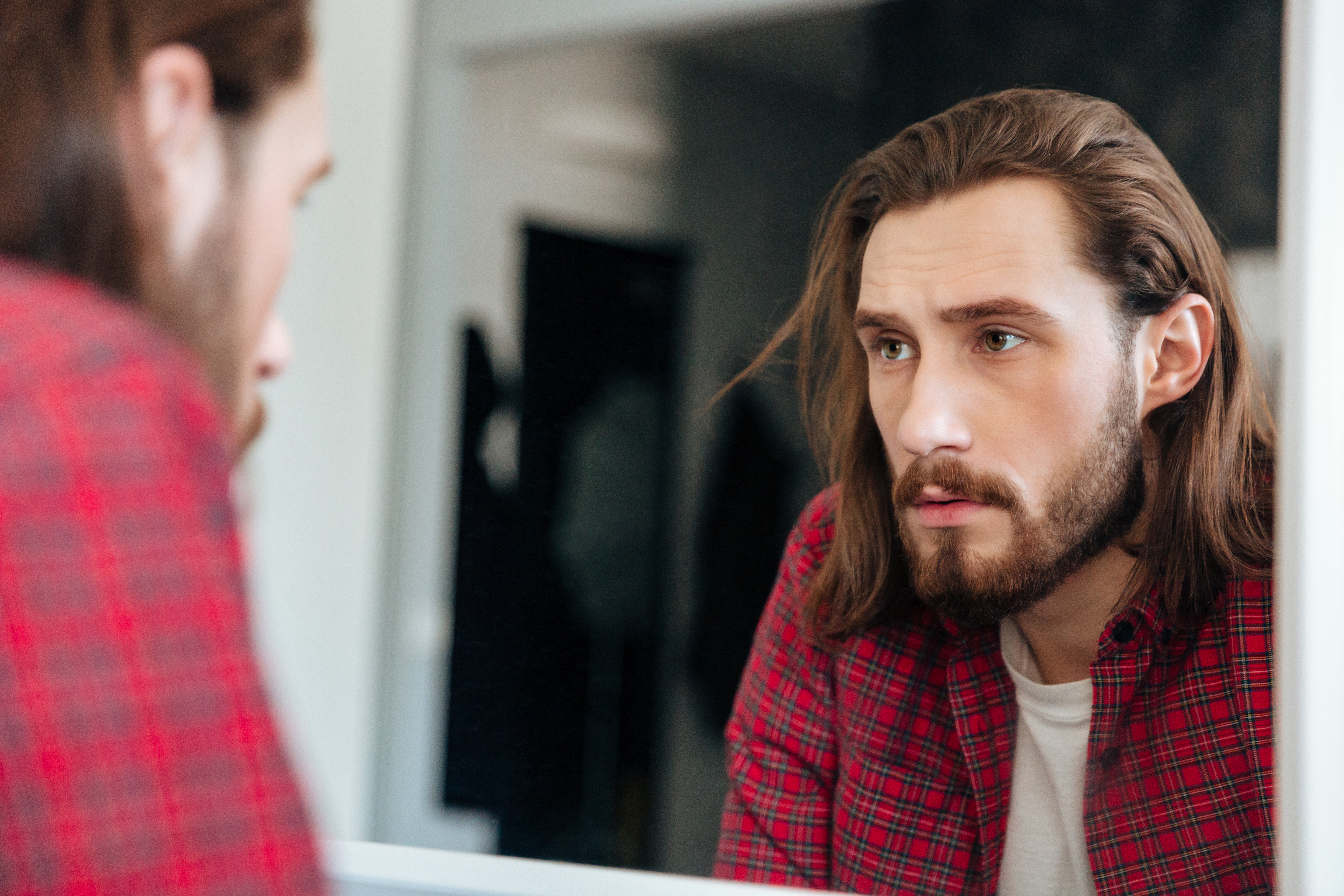 man evaluating the possibility of changing career