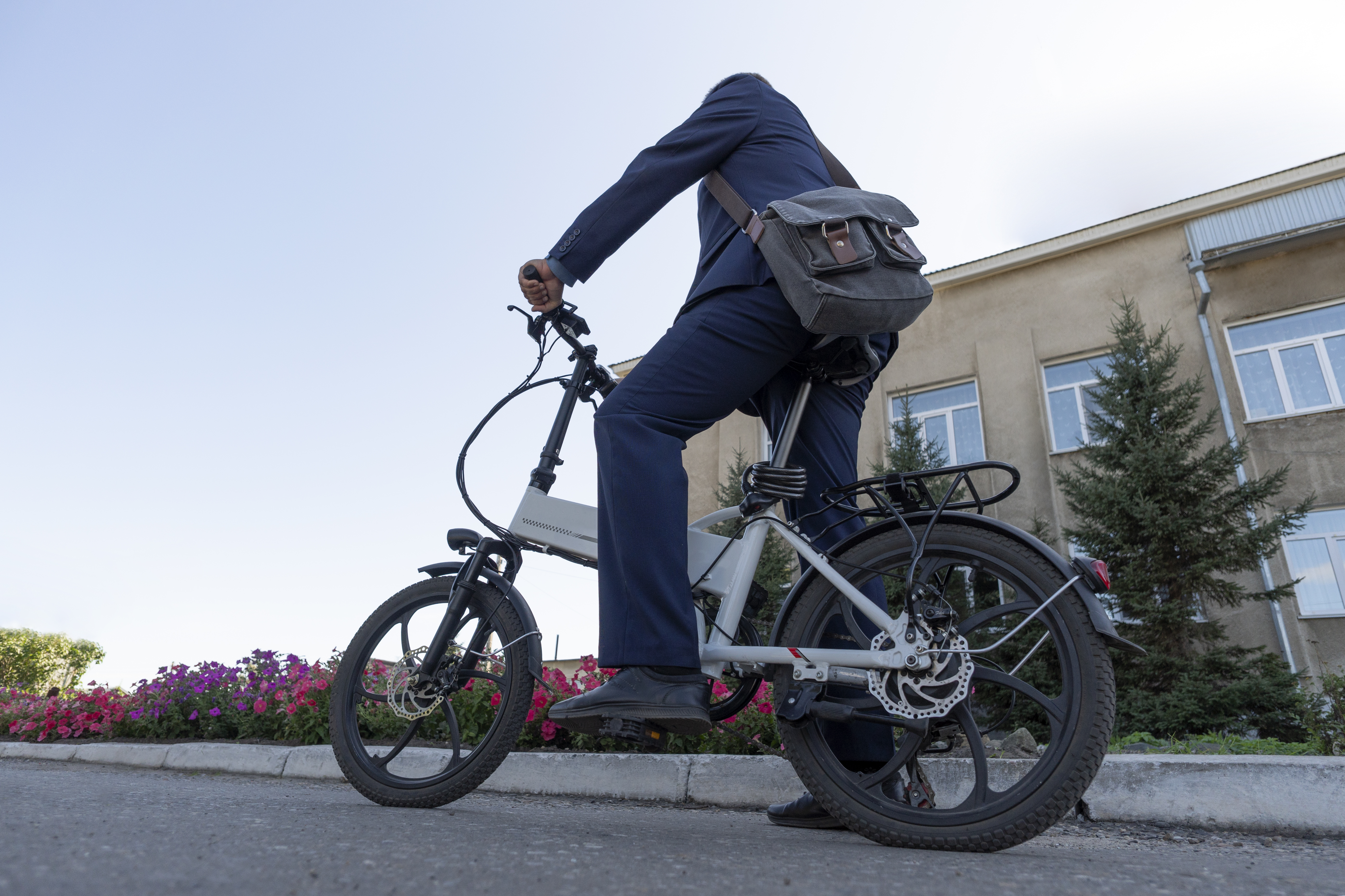 new-modern-alternative-mode-transport-ecofriendly-electric-bike-hipster-businessman-commuter-with-electric-bicycle-traveling-work-city